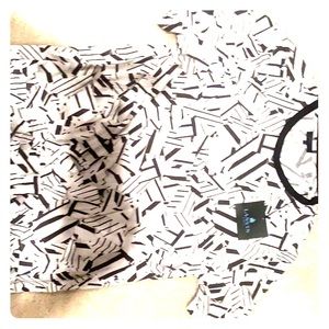 Alan in black and white tee